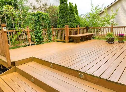 Raised timber decking with balustrade built by Glasgow Decking Group